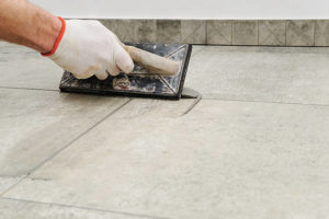 Tile grouting